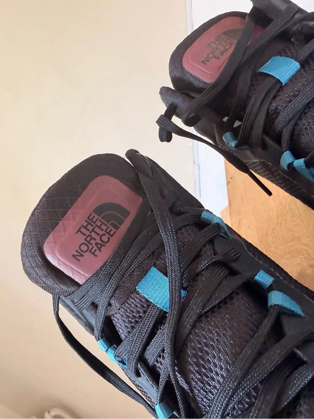 The North Face Kids Black Sneakers with Pink and Blue Accents